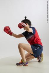 Sportswear Woman Asian Kneeling poses - ALL Average Kneeling poses - on one knee medium black Standard Photoshoot Academic